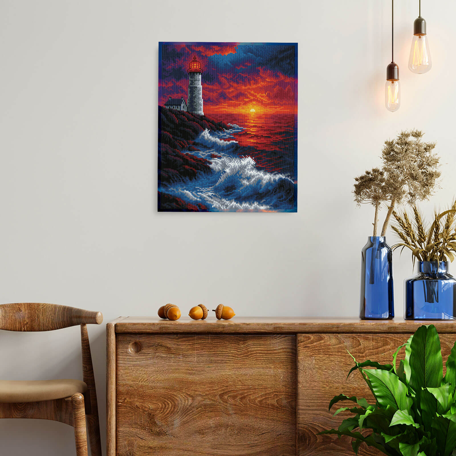 Varvikkaan timanttimaalaus Majakka Auringonlaskussa seinälle ripustettuna.